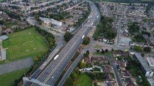 Aerial view of Luton, England showing roads, intersections, and urban development.