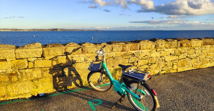 E-bike against a sea wall