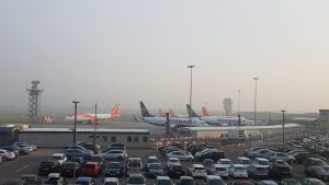 vehicle parked in airport during daytime