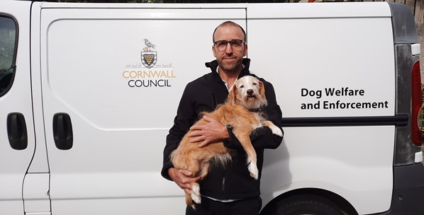 Dog Welfare and Enforcement Officer Jason Williams with his dog