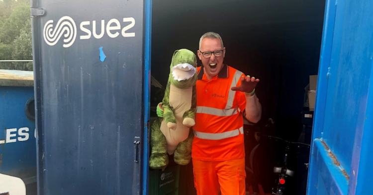 James Maughan with a dinosaur soft toy